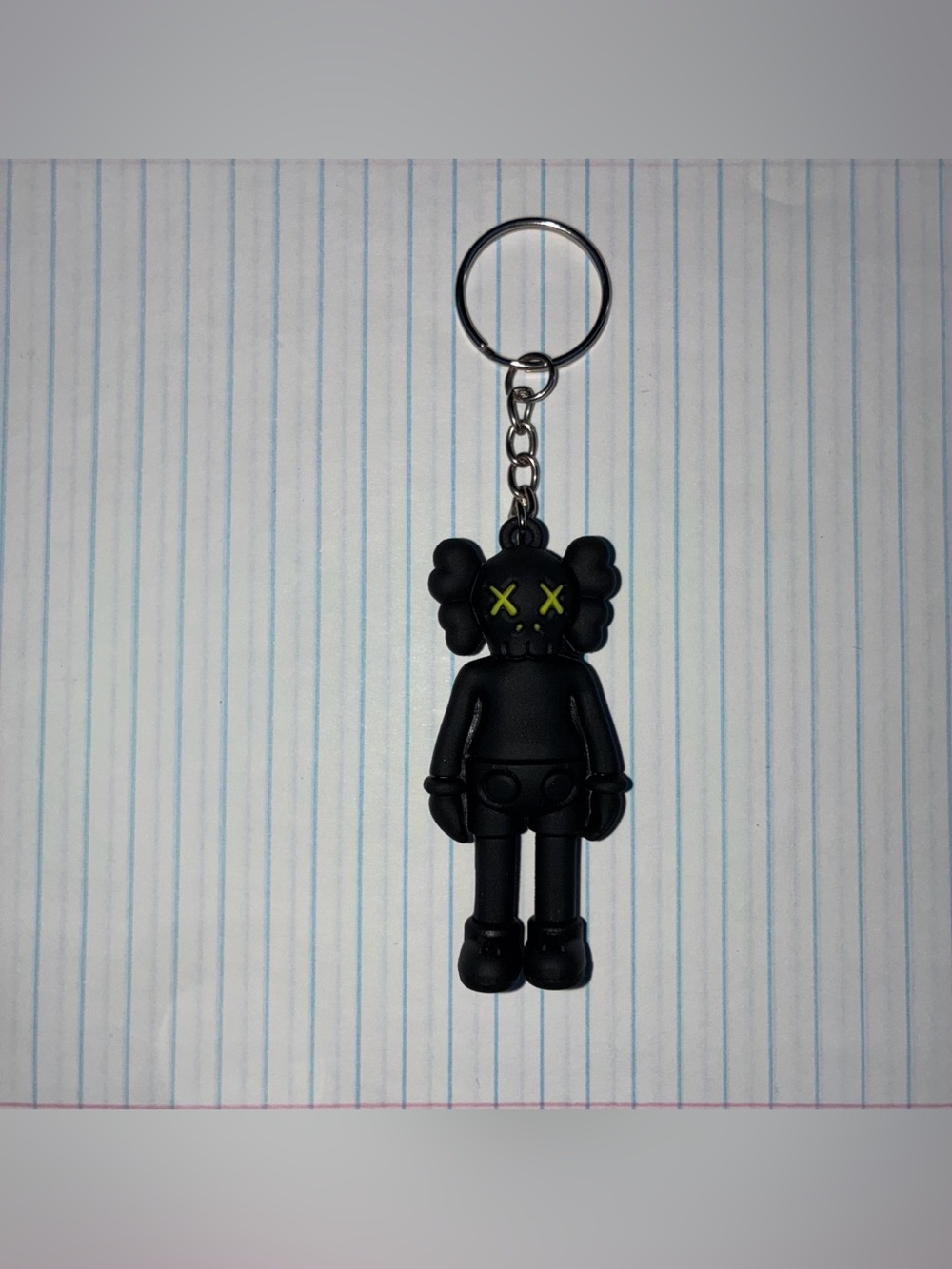 KAWS Black Vinyl Figure Keychain with Green Crossed Eyes